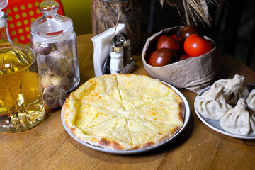 Georgian cuisine foodset from khachapuri, khinkali, pkhali, dolma, satsivi top view