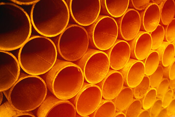 Gold metal pipes and adapters of different diameters for gasification or water supply. Industrial...