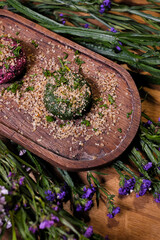 falafel balls on a wooden cutting board, selective focus