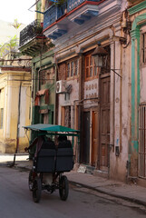 Fototapeta na wymiar The tricycle, common transport in Havana, Cuba