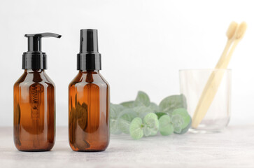 Cosmetic bottles in the bathroom. Skin care product, after shower moisturizer, skin moisturizing lotion