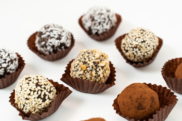 Chocolate candies collection. Beautiful Belgian truffles isolated on white background