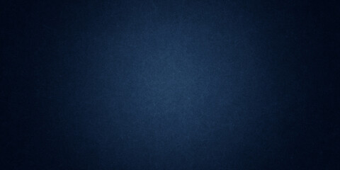Dark blue background texture with black vignette in old vintage grunge textured border design, dark elegant teal color wall with light
