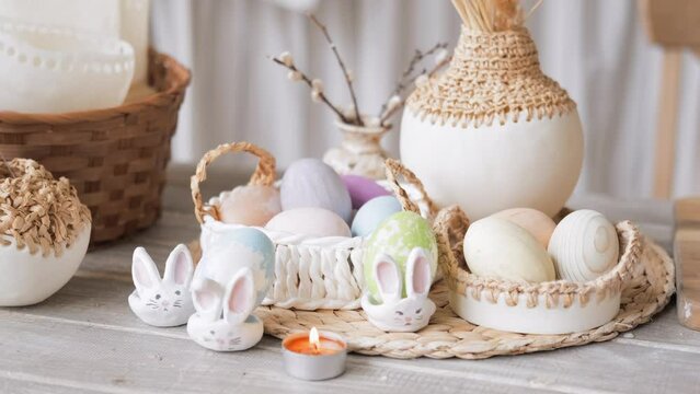 Happy Easter design interior, preparation for easter holiday, easter bunny, Easter eggs on table, boho style scandinavian