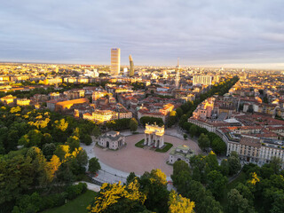 Obraz premium Aerial view of Arco della Pace in Milano, north Italy. Drone photography of Arch of Peace in Piazza Sempione, near Sempione park in the heart of Milan, Lombardy and Sforza Castle.