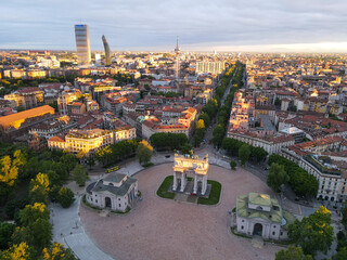 Aerial view of Arco della Pace in Milano, north Italy. Drone photography of Arch of Peace in Piazza Sempione, near Sempione park in the heart of Milan, Lombardy and Sforza Castle.
