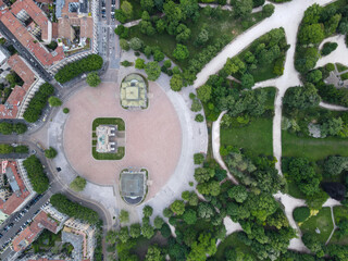 Aerial view of Arco della Pace in Milano, north Italy. Drone photography of Arch of Peace in Piazza Sempione, near Sempione park in the heart of Milan, Lombardy and Sforza Castle.