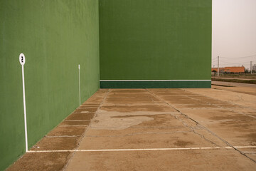 green covered fronton court for playing hand Pelota, Spain - obrazy, fototapety, plakaty