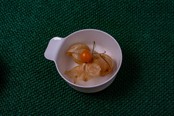 physalis inside a white bowl