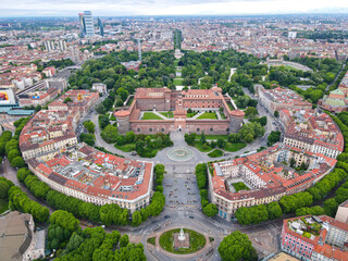 Aerial view of Castello Sforzesco (Sforza castle) in Milan. Drone photography in Lombardia. Historic medieval Sforza fortress and Arco della Pace in Sempione park, north Italy, in Europe.