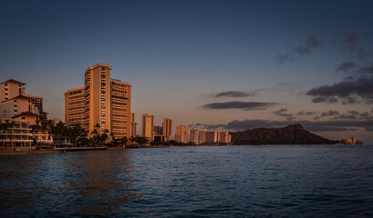 Panoramic shot of Waikiki neighborhood and Diamond Head volcano in the evening