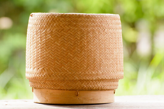Closeup of a bamboo basket container for making glutinous or sticky rice