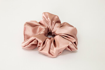silk Scrunchy isolated on white. Diy accessories and hairstyles concept, luxury color