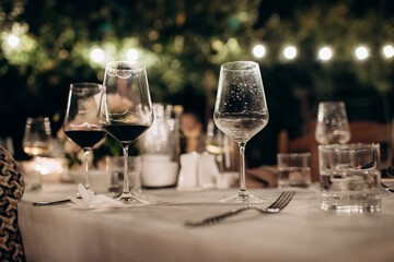 glasses with unfinished alcoholic drink at a party