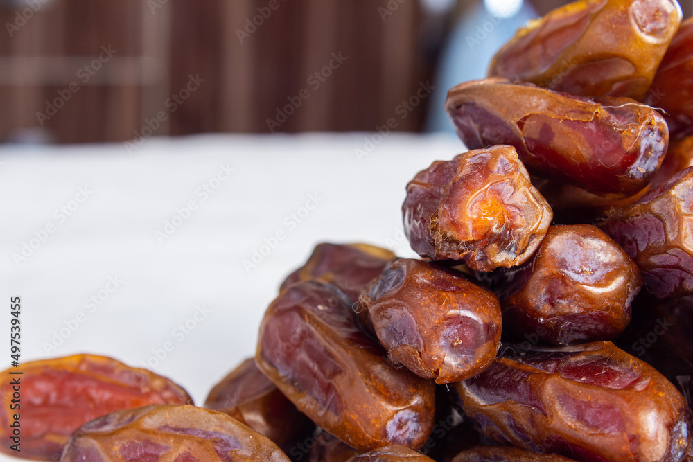 Poster stack of date fruits with space for text