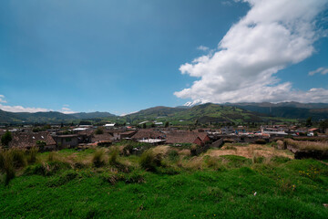 Panoramic view of the town of Olmedo in the province of Cayambe with the Cayambe volcano in the...