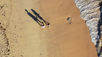 High view shot of a Russian couple enjoying their time on a vacation in Gili Meno, Lombok, Indonesia