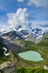 Typical alpine landscape of Swiss Alps with Steinsee, Urner Alps, Canton of Bern, Switzerland