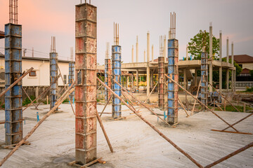 building process of a house column in construction site on housing project