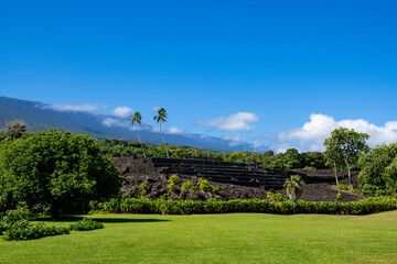 Ancient ruins of the Pi'ilanihale Heiau Temple in the tropical landscape of Kahanu Garden, Hana,...
