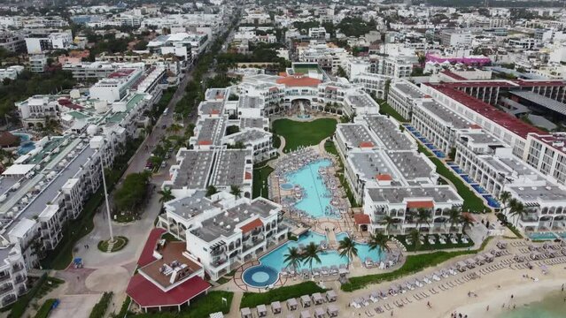 drone aerial tilt shot of the hotel resorts at playa del carmen mexico