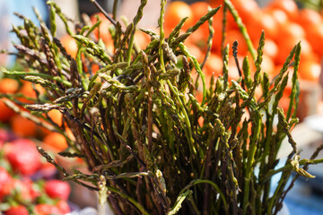 bunches of wild asparagus on market                              