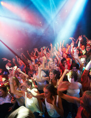 Every song rocks. Shot of a large crowd at a music concert- This concert was created for the sole...