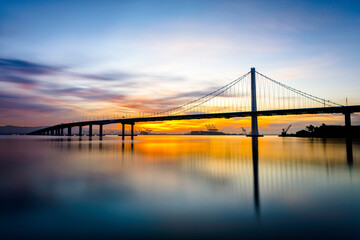 Fototapeta na wymiar Sunrise at Bay Bridge, San Fransisco, California