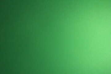 Green background. Light gradient. Texture on the background.
