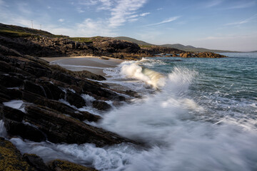 Scenic view of light glancing off crashing waves on Harris, Scotland