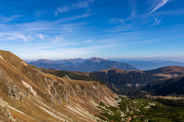 Panoramic view from Seckauer Zinken in the Lower Tauern mountain range, Styria, Austria, Europe. Eisenerz Alps in the distance. Sunny autumn day in the Seckau Alps. bare and rocky terrain. Wanderlust