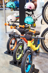 Obraz premium Children bicycles and helmets in sport store