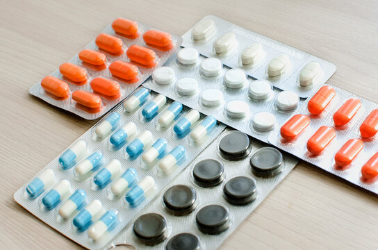 pills in blisters for the treatment of diseases. Close-up, selective focus.