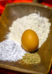 baking utensils on an old wooden plate