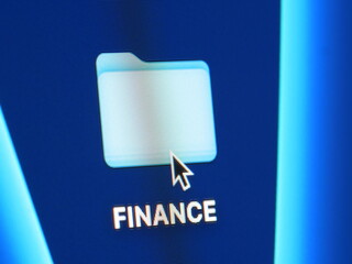 Finance - photo macro d'un dossier sur un écran d'ordinateur