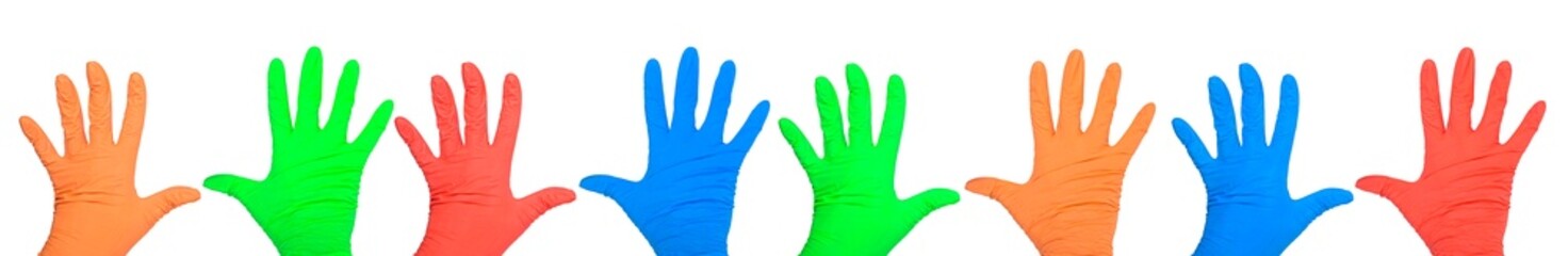 Collection of colored medical gloves. Hands of a medic wearing a latex gloves. Surgical glove.