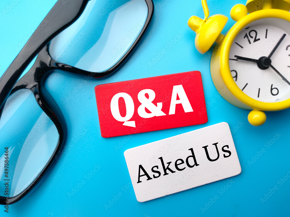 Poster glasses,clock and colored cube are written with text q and a asked us on blue background.