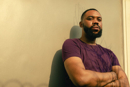 wide angle portrait of a black african male plant enthusiast 