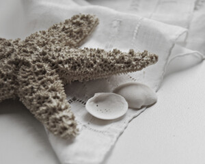 Starfish and Shells on White Linen