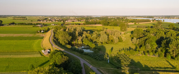Mesmerizing view of the Dutch polder landscape on a sunny day near the village of Herwijnen