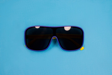 baby sunglasses on a blue background