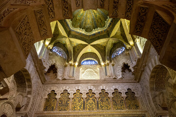 Medieval moorish architecture, colorful walls with ornament in old mosque in Cordoba with no...
