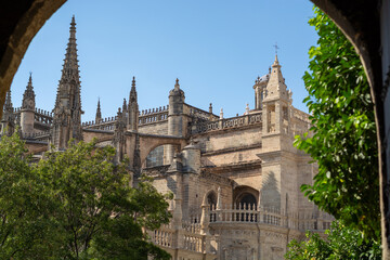 Obraz premium Old historical Andalusian town Seville, Spain. View on architectural details of Gothic cathedral church.