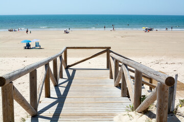 Fototapeta premium Golden sandy beaches near Sanlucar de Barrameda, small Andalusian town, Spain