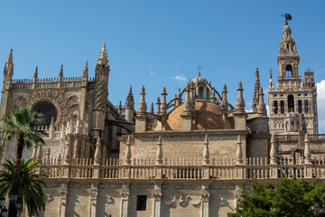 Obraz premium Old historical Andalusian town Seville, Spain. View on architectural details of Gothic cathedral church.
