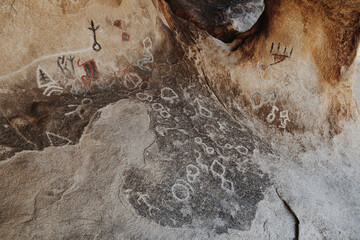 Rock texture with old pictograms - ancient historical wall
