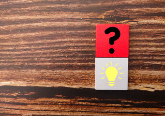 Colored cubes with question and idea icons - the concepts of business