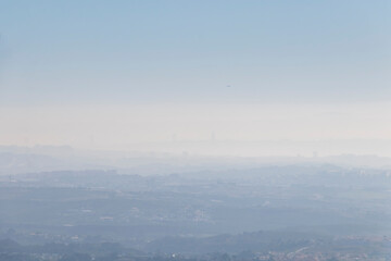 Blue background with silhouette of the city skyline in the morning