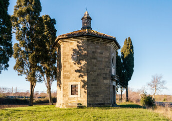 Oratory of San Guido at sunset. It was built by the Gherardesca family in front of the famous 