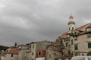 Beautiful historic church with a picturesque belltower in Sibenik, on the dalmatian coast in Croatia in winter time.